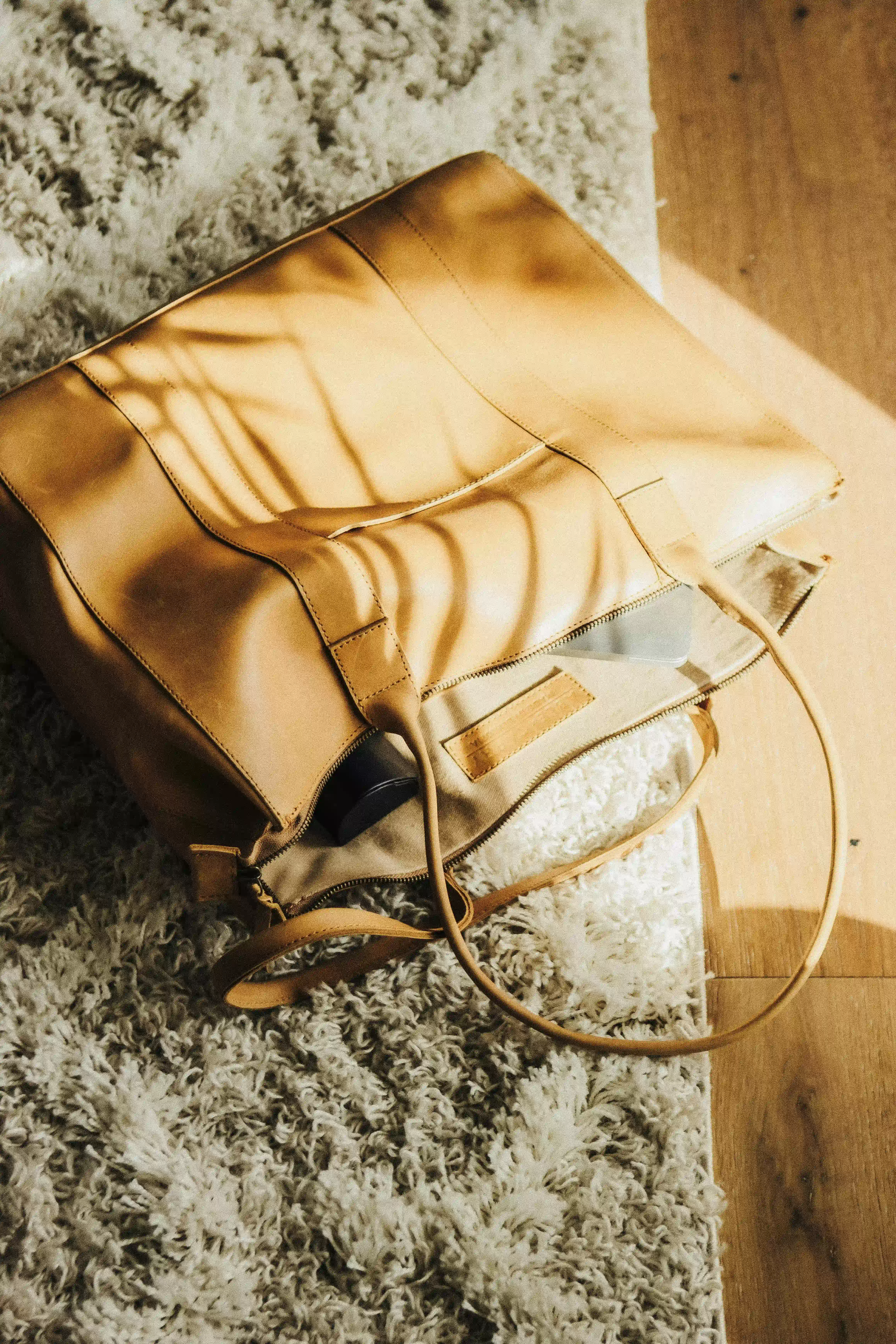 Belsh Leather artisan crafting a leather bag